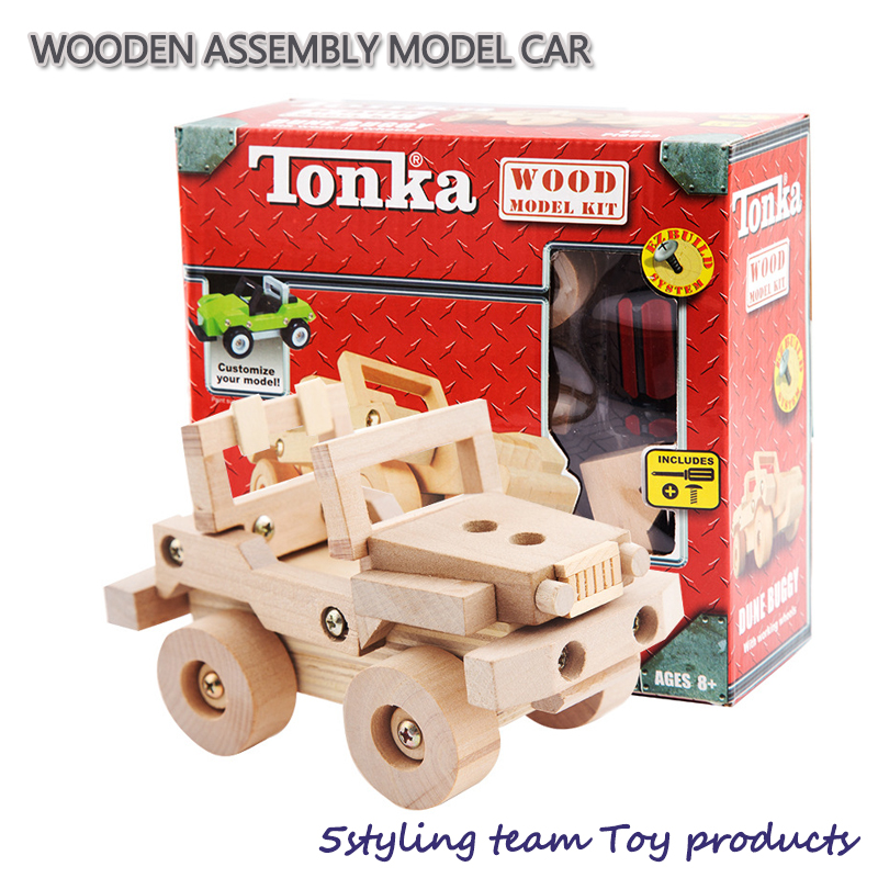 Ægte træsamling og demontering af modeller til truck-skovle til børn fra egen hånd på undervisningslegetøj blandet